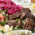 BEEF Kabab with rice and vegetables on a plate